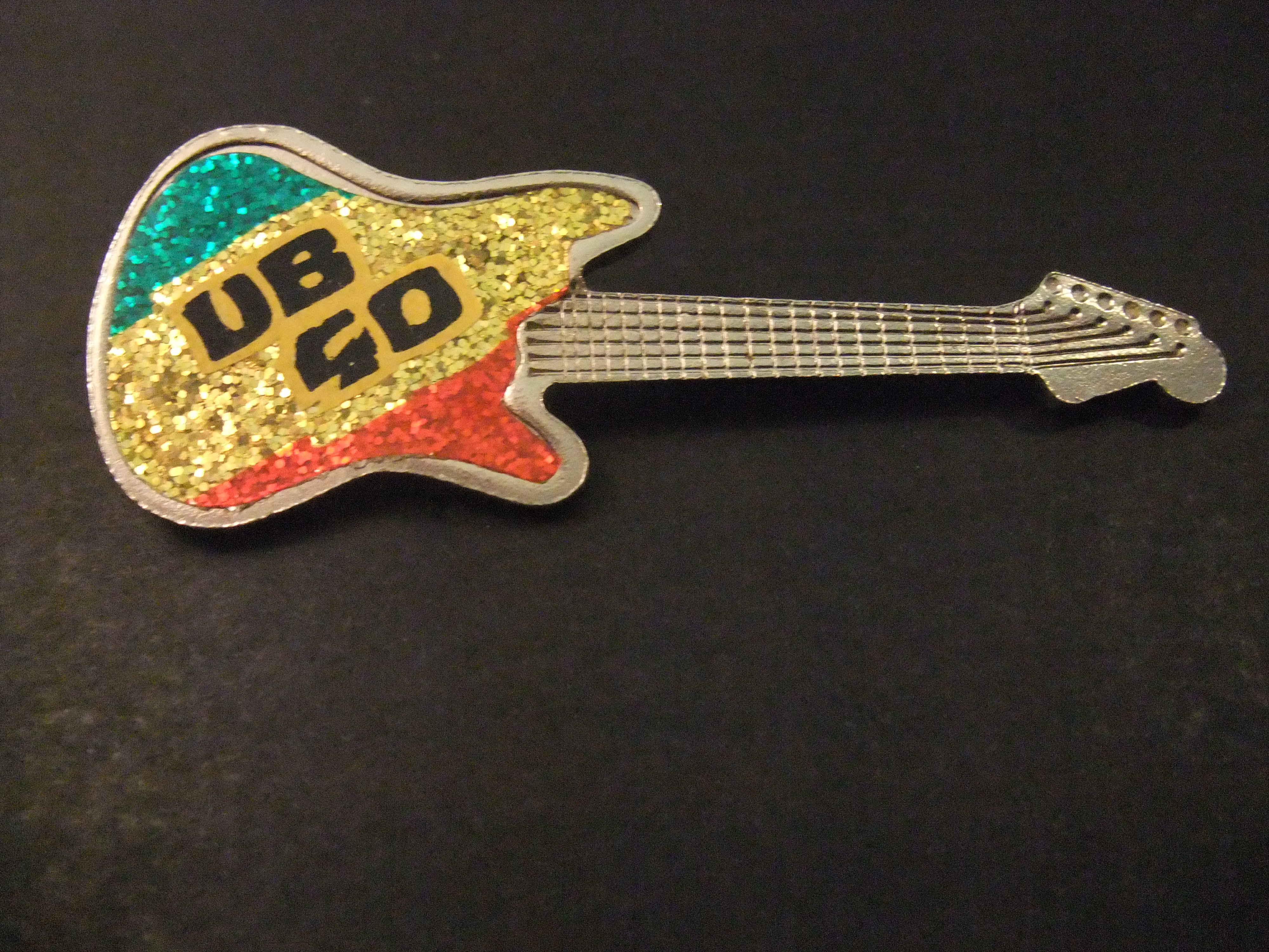 UB40 reggae- en popgroep (Birmingham) gitaar